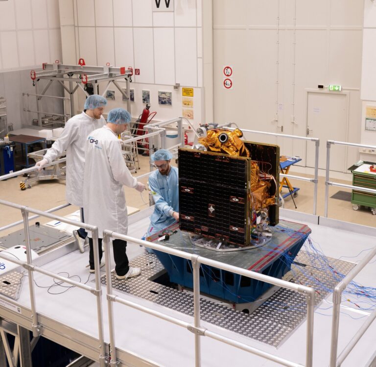 ESA’s Arctic weather satellite passes environmental test for orbit ESA researchers work on the Arctic weather satellite.