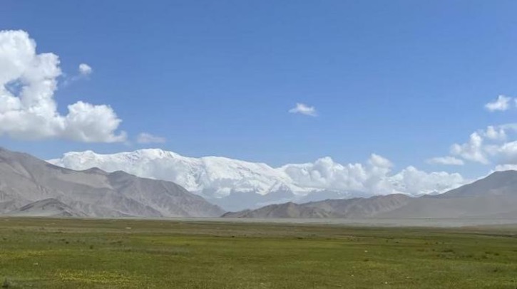 Chinese Academy of Meteorological Sciences improves near-term precipitation projections Fluffy white clouds float closely above the Qinghai-Xizang Plateau.