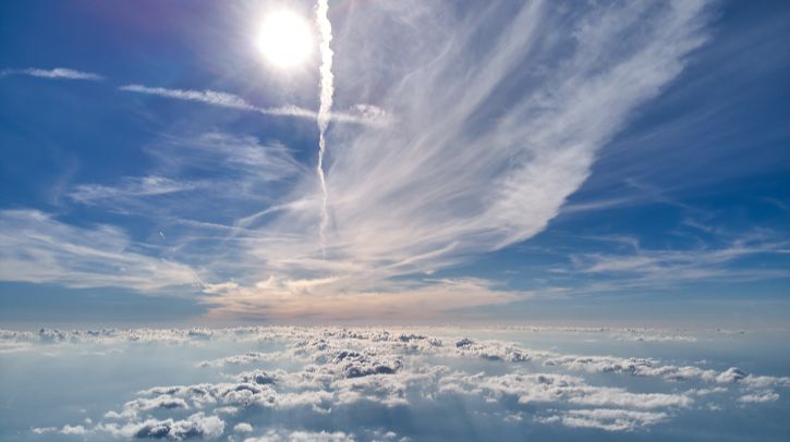 Hole in the ozone layer is recovering, says WMO A picture taken at altitude of clouds in the sky and the sun above looking out towards space