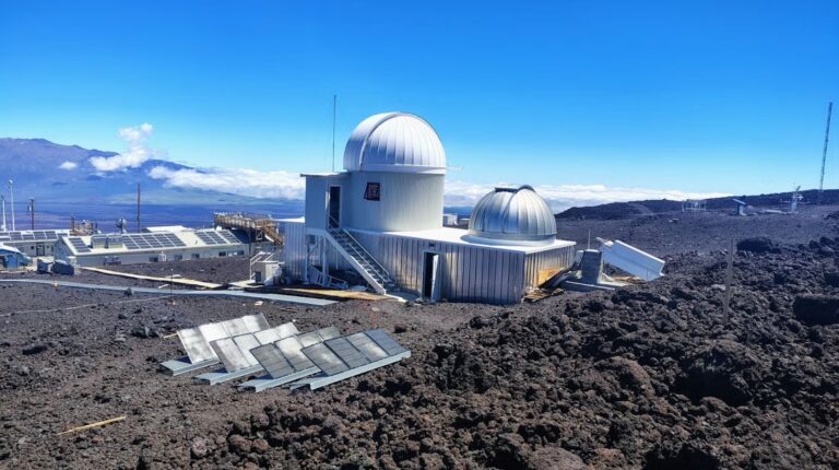 Mauna Loa Solar Observatory reopens to support Artemis II mission The Mauna Loa Solar Observatory stands on a hillside with a large blue sky above it.