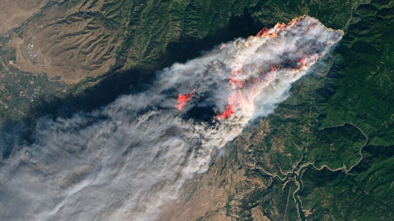 NASA satellites captured dramatic imagery of the 2018 Camp Fire in California, showing massive smoke plumes, burn scars and damage assessments from space.