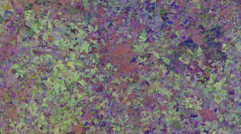 Cambridge AI tool converts satellite archives into accessible Earth intelligence A satellite image of Cambridge and surroundings, as represented by Tessera's embeddings. Credit: Tessera/University of Cambridge.