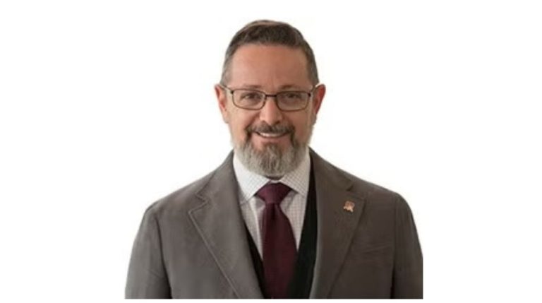 Stephen Ettinger named UCAR CFO Headshot of Stephen Ettinger, wearing a white shirt, a maroon tie and a dark brown jacket.
