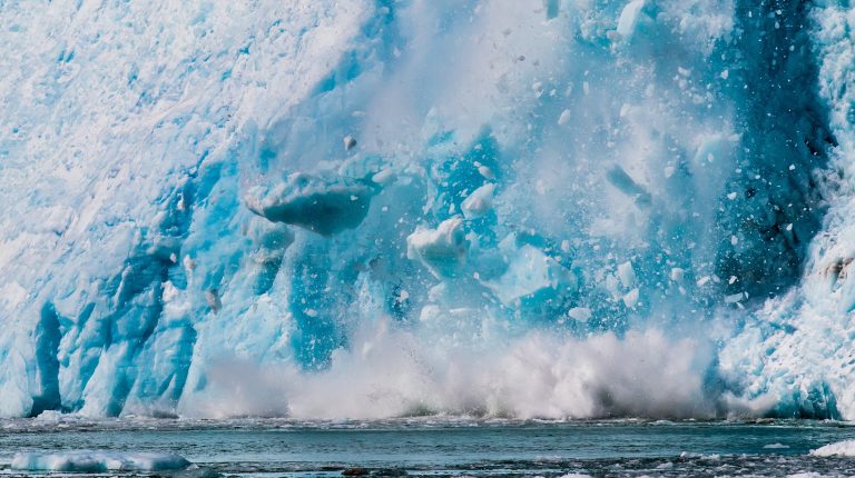 Photograph of the Northwestern Glacier calving into the sea.