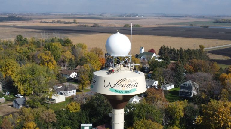 Climavision opens radar network and forecasting platform to AI data centers ahead of 2027 grid deadline Aerial view of a large weather radar in a remote rural location.